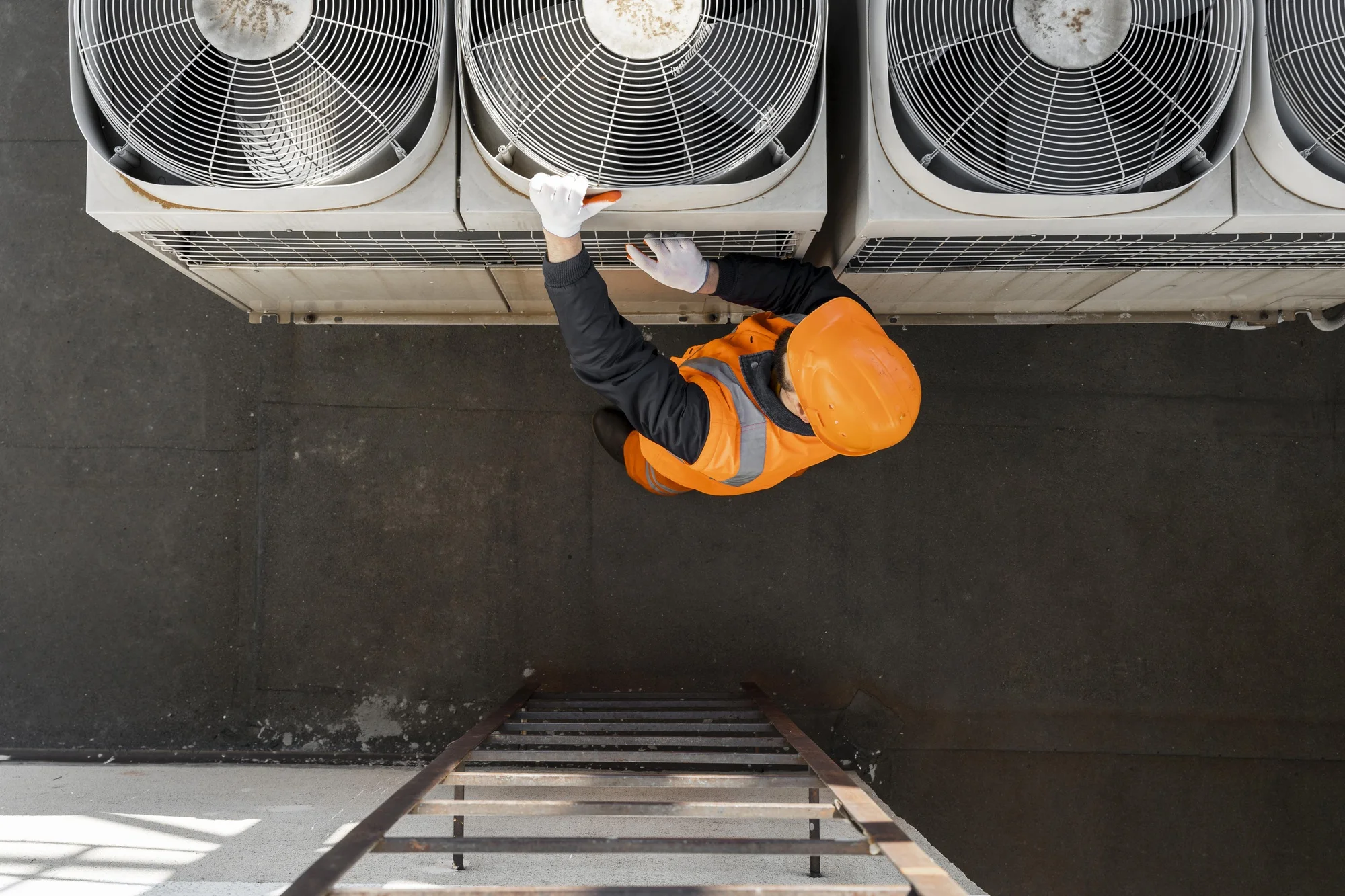 Professional cleaner using specialized equipment for duct cleaning